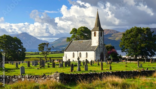 A serene church surrounded by a cemetery and majestic mountains