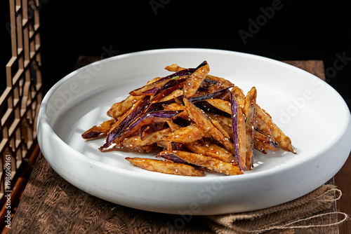 фотографія Sweet and sour fried eggplant with soy sauce flavor