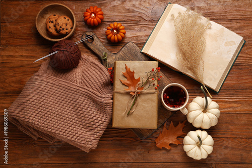 Books with cup of tea, knit...