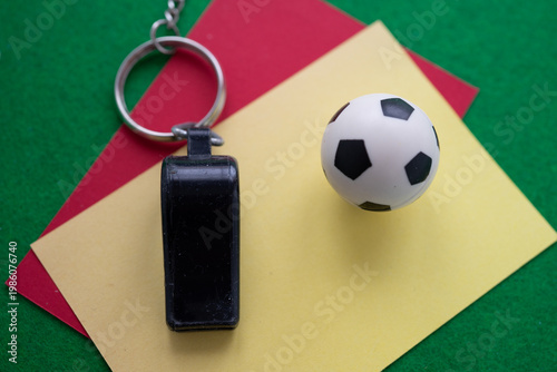 Tableau sur toile Red and yellow cards with a whistle and soccer ball