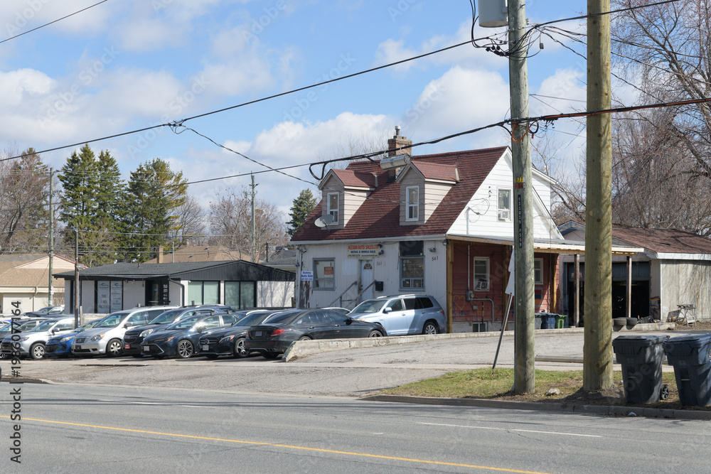 Obraz premium wide view of Alexan Auto Sales, a used car dealer, located at 561 Kennedy Rd, Scarborough, Toronto