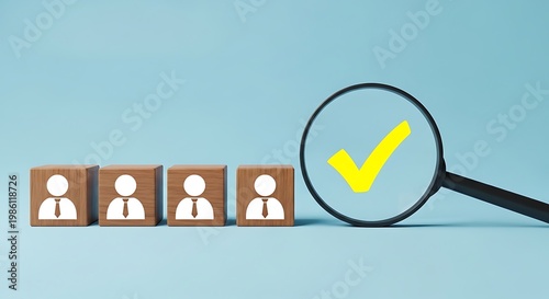 Business people selection concept with wooden blocks and magnifying glass