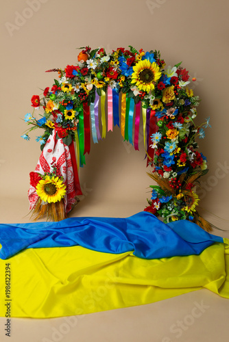 An arch in Ukrainian ethnic style and the Ukrainian flag