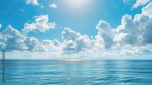 A large body of water with clouds in the sky, great for travel or nature scenes