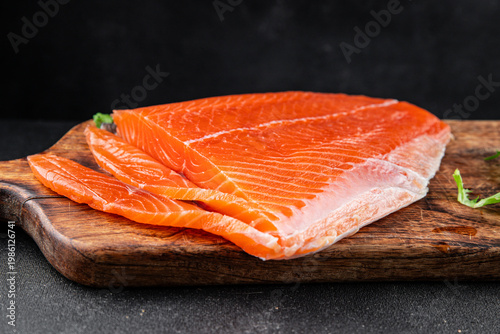 Salmon fresh fish lightly salted red fish seafood tasty snack fresh gourmet food background on the table rustic food top view copy space vegetarian food pescetarian diet