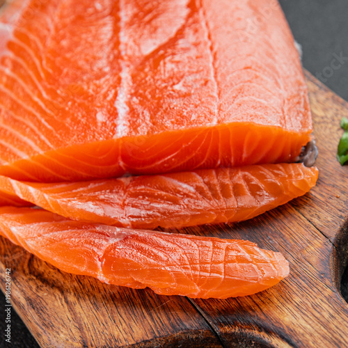 Salmon fresh fish lightly salted red fish seafood tasty snack fresh gourmet food background on the table rustic food top view copy space vegetarian food pescetarian diet