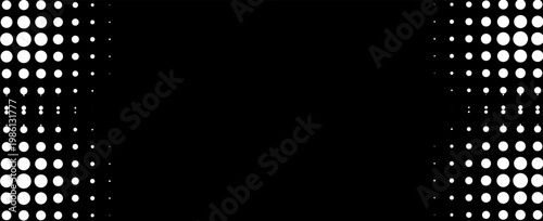 A large group of people are gathered in a city at night.