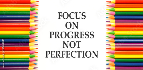 Progress or perfection words symbol. Concept words Focus on progress not perfection on beautiful white paper. Beautiful white paper background. Business progress or perfection concept. Copy space.
