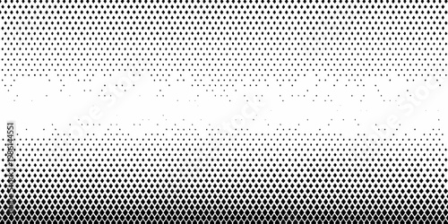 Graduated halftone pattern transitioning from dense dots to white space