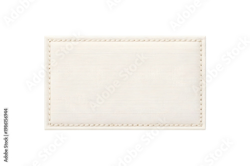 Blank white stitched fabric label isolated on white background