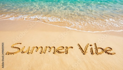 Text Summer Vibe written on tropical sand beach. Ocean wave washing shore at sunny day. Seasonal vacation concept. Tourism marketing background for travel agency and holiday getaway.