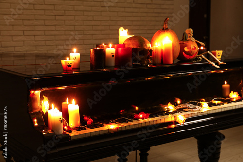 Grand piano with burning ca...
