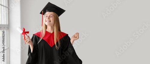 Happy female graduating stu...