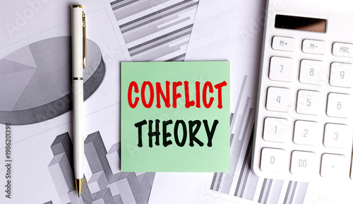 Photos Conflict theory concept on sticky note with calculator pen and financial charts