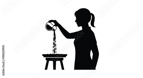 Woman pouring water into a basin depicted as a striking silhouette