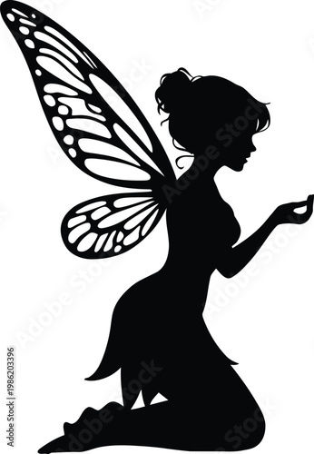 Silhouette of a fairy with detailed wings kneeling and holding an object