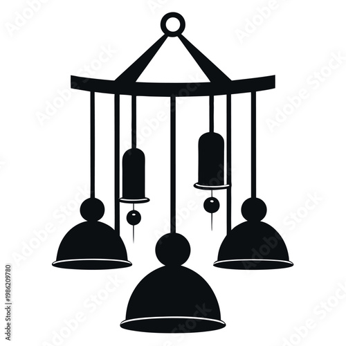 A silhouette of a wind-chime hanging static 