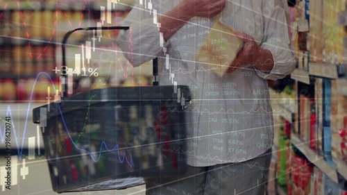 Vertical video: Shopper reaching shelf examining box while finance graphs tracking checking prices