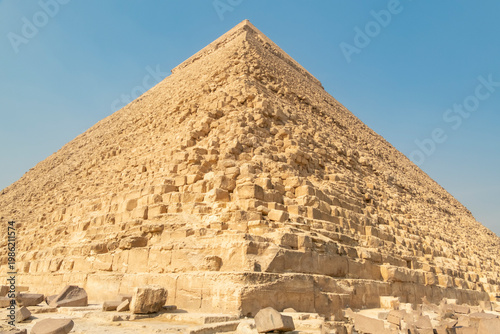 Visit to the Great Pyramid of Giza in Egypt during a sunny day with clear skies and vast desert around it