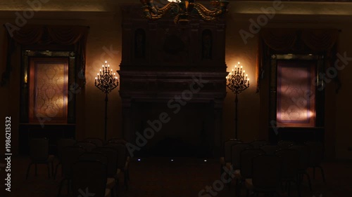 Elegant interior hall with fireplace and warm lighting in West Palm Beach Florida