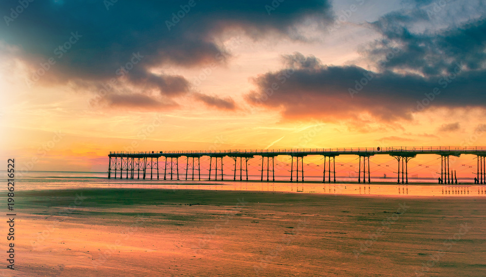 Fototapeta premium Sunset pier at Saltburn by the Sea, North Yorkshire, UK