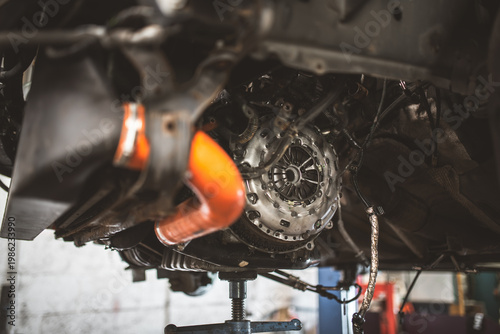Принти на полотні Close-up view of a car's transmission clutch assembly during repair or maintenan