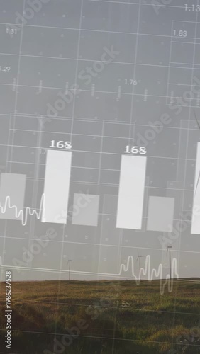 Vertical video: Turbine rotating while sensor driving overlay with power bars  and  wave tracking kW