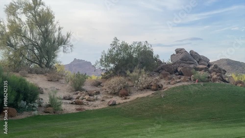A desert golf course located in the American southwest.