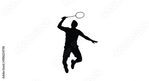 Silhouette of a badminton player in mid air preparing to smash