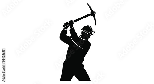Silhouette of a miner swinging a pickaxe with determination