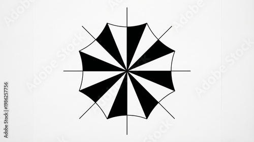 Symmetrical eight-pointed star design with alternating black and white triangular sections radiating from center, creating striking radial contrast and geometric balance.