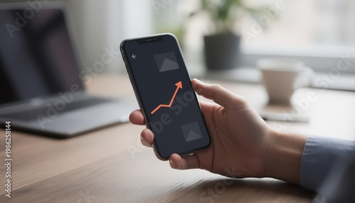 Medium frame capturing a hand navigating a minimalist app interface for a lowcost world equity fund the dashboard graph sharply contrasted against a softly blurred workspace.