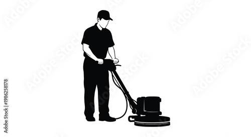 Silhouette of a man operating a floor scrubbing machine indoors
