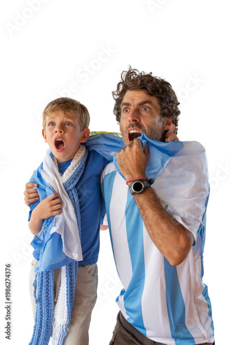 Foto Father and son, fans of Argentine football, watching a match