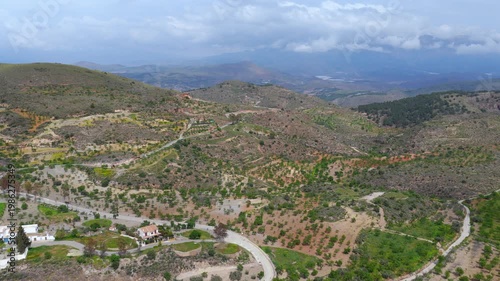 Flight over mountain to a barrier lake in mountains (Embalse de Beninar, Spain) Aerial video