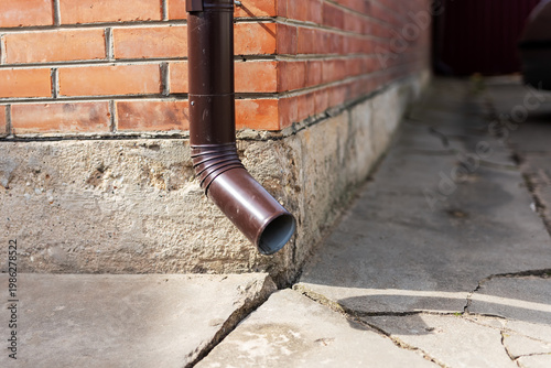 Assessing foundation issues. Reviewing foundation stability and stormwater management strategies