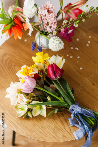 Happy Mothers day! Beautiful bouquet on wooden table flat lay. Holiday greetings with space for text. International women's day. Valentine's day