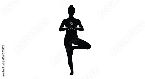 Silhouette of a woman performing the tree pose yoga asana