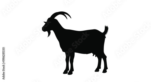 A striking silhouette of a majestic goat stands in profile