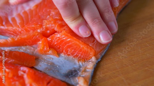 top-down view of smoked salmon being sliced into thin strips, Healthy Seafood Meal Prep Texture, Gourmet Fish Fillet Slices for Mediterranean Diet