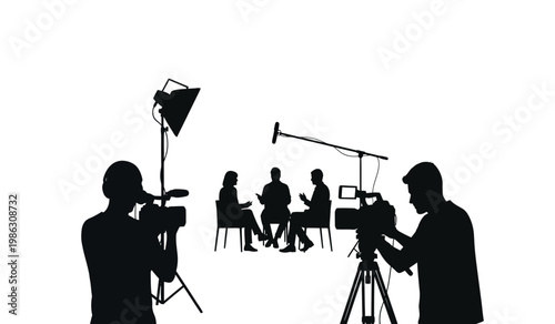 A black and white image depicts a film crew actively recording an interview with four seated subjects showcasing a dramatic silhouette high quality professional