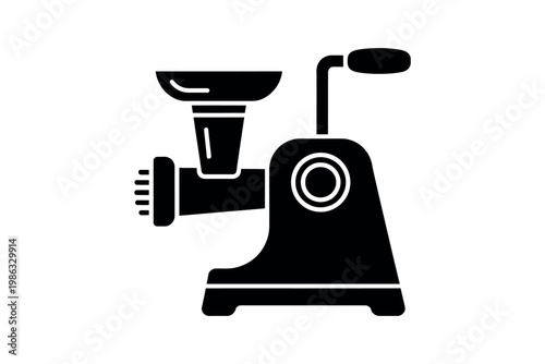 Manual meat grinder appliance stands isolated on a white surface.