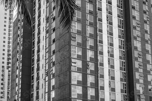 Collage of Overlapping Skyscrapers with Similar Designs.