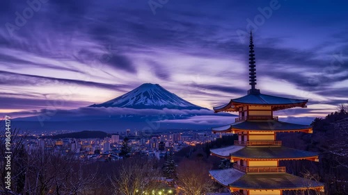 山梨県・新倉山浅間公園で夕暮れの富士山と雪景色の街並み