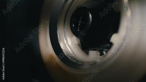 Retro radio tape recorder, audio cassette close-up. Listening to music, old radio boom box player, macro of vintage music listening. 