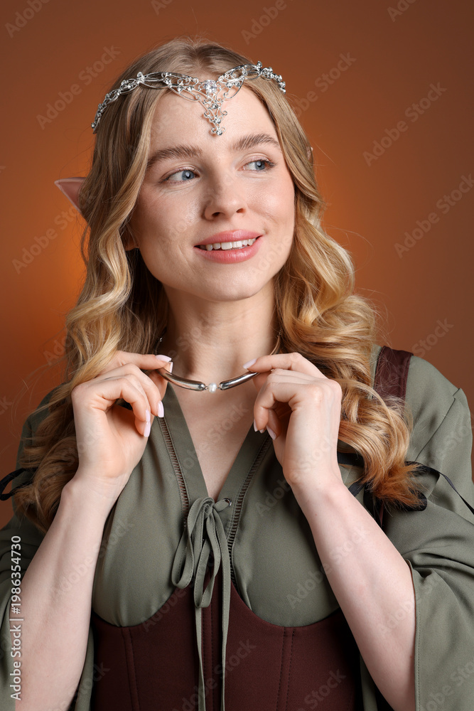 Naklejka premium Beautiful elf girl on brown gradient background
