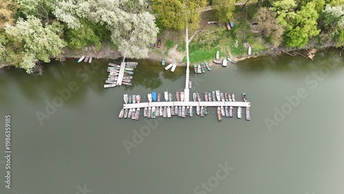 Aerial view of bridge over river oxbow with lush green landscape