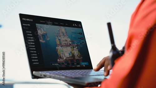 Tableau sur toile Close up of laptop used by drilling rig worker to monitor infrastructure systems