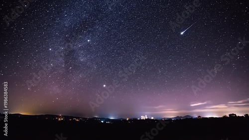 A Quiet Night Sky Full of Stars Over a Distant Horizon with Gentle Lights