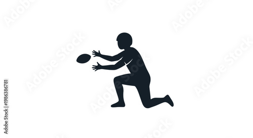 Silhouette of Man Catching Rugby Ball.